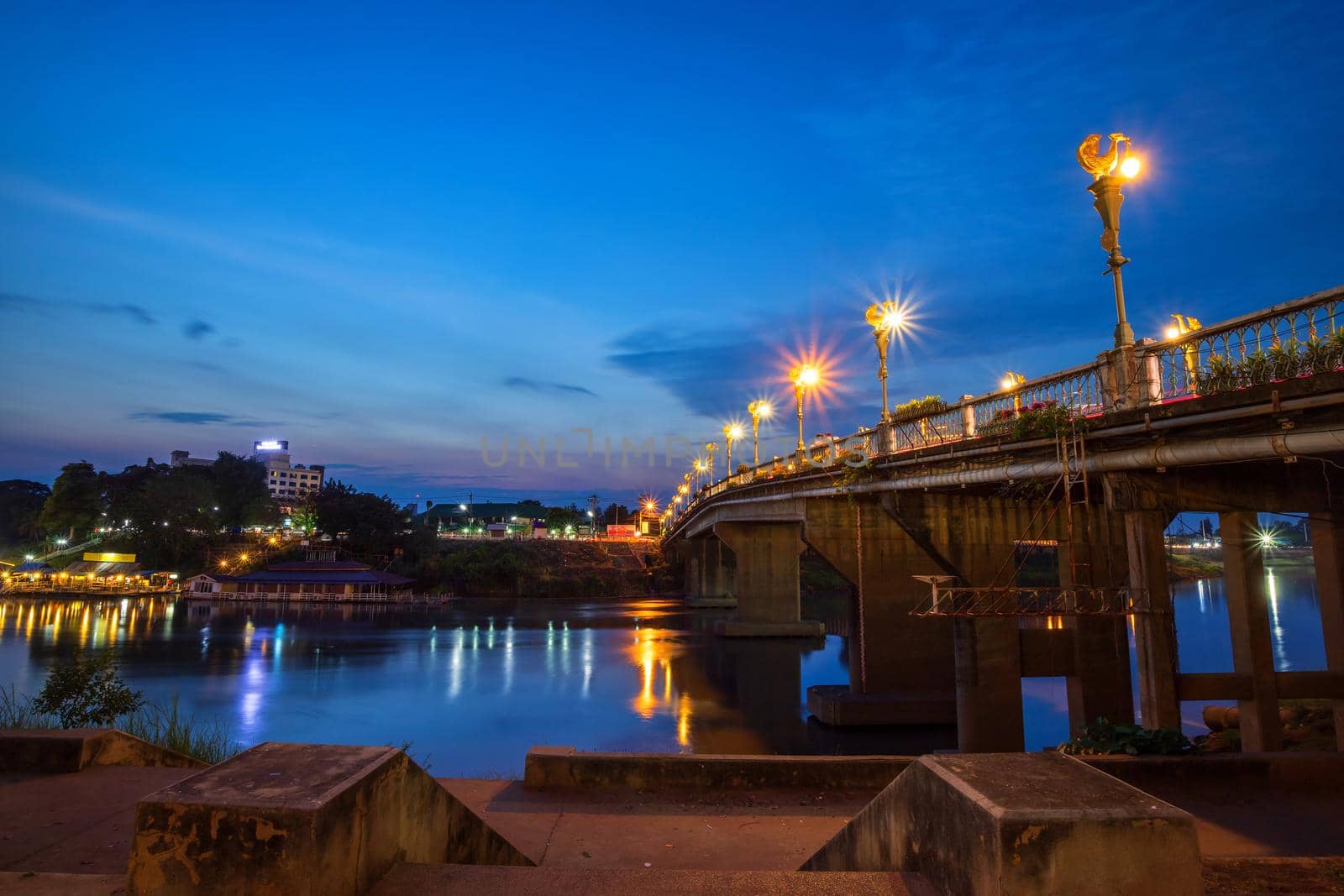 The color of Night traffic light on the road on the bridge (Eka Thot Sa Root Bridge) in Phitsanulok, Thailand.