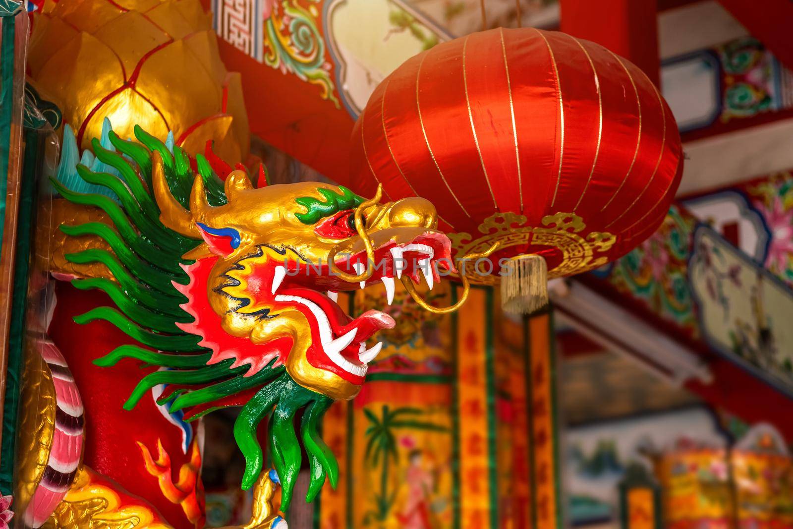 Beautiful Chinese dragons and red lantern on a temple for Chinese New Year Festival at Chinese shrine.