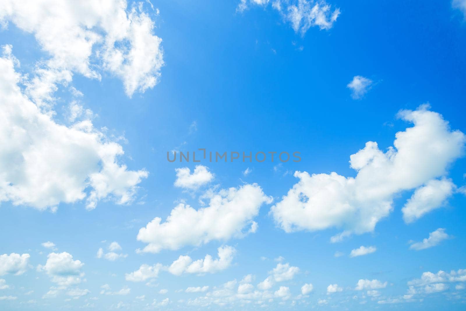 blue sky background texture with white clouds.