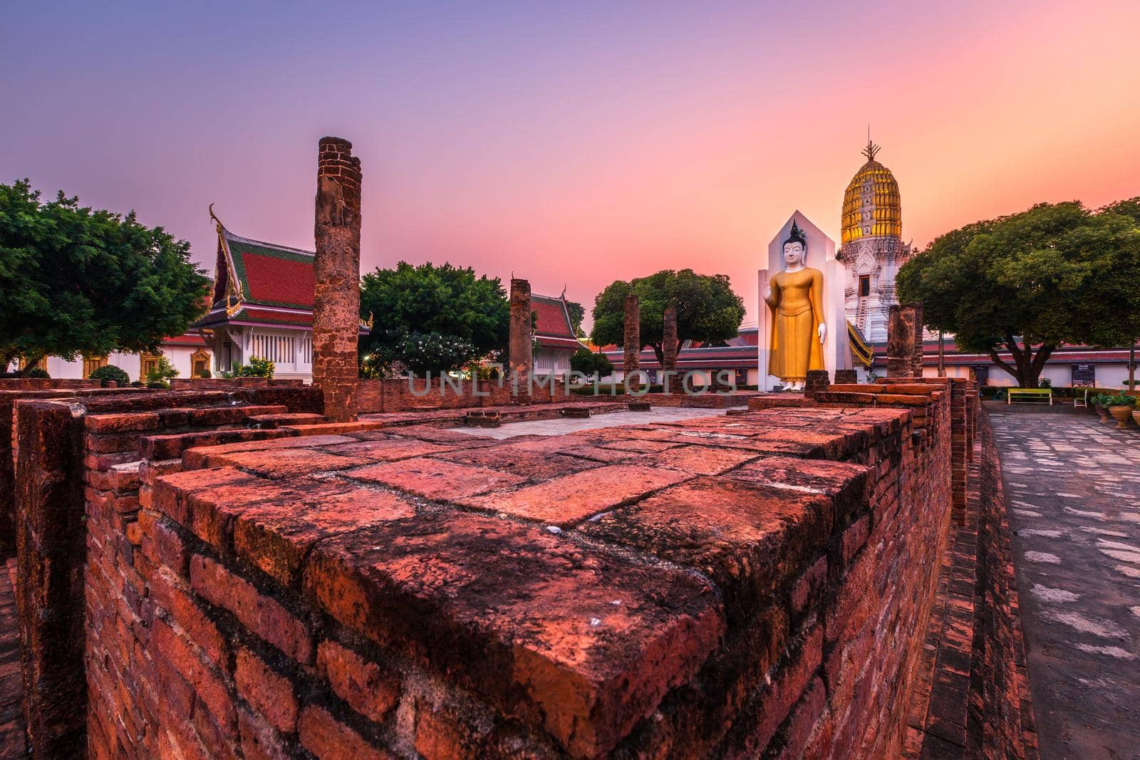 Buddha statue at sunset are Buddhist temple at Wat Phra Si Rattana Mahathat also colloquially referred to as Wat Yai is a Buddhist temple It is a major tourist attractions in Phitsanulok,Thailand.