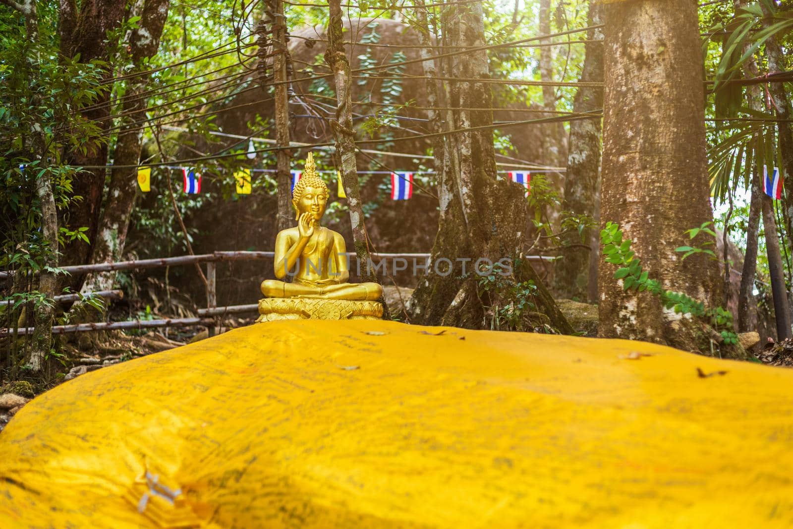 Buddha statue beautiful On the way up at The stone with the footprint of Lord Buddha at Khitchakut mountain It is a major tourist attraction Chanthaburi, Thailand.