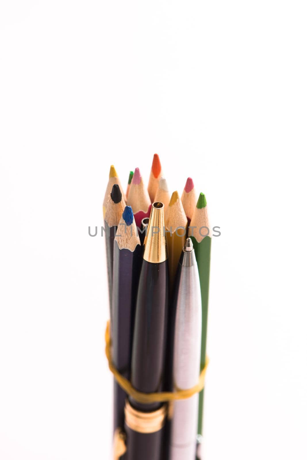 Close up color pencils isolated on white background.