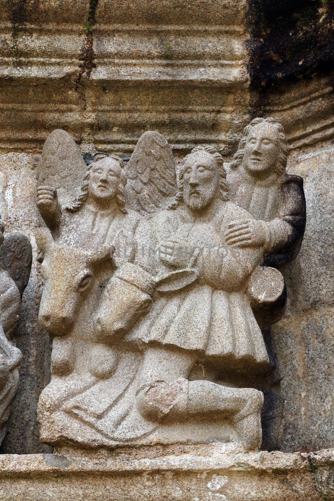 Detail of scene - Biblical motifs - on the stone Calvary in Parish close Guimiliau, Brittany, France