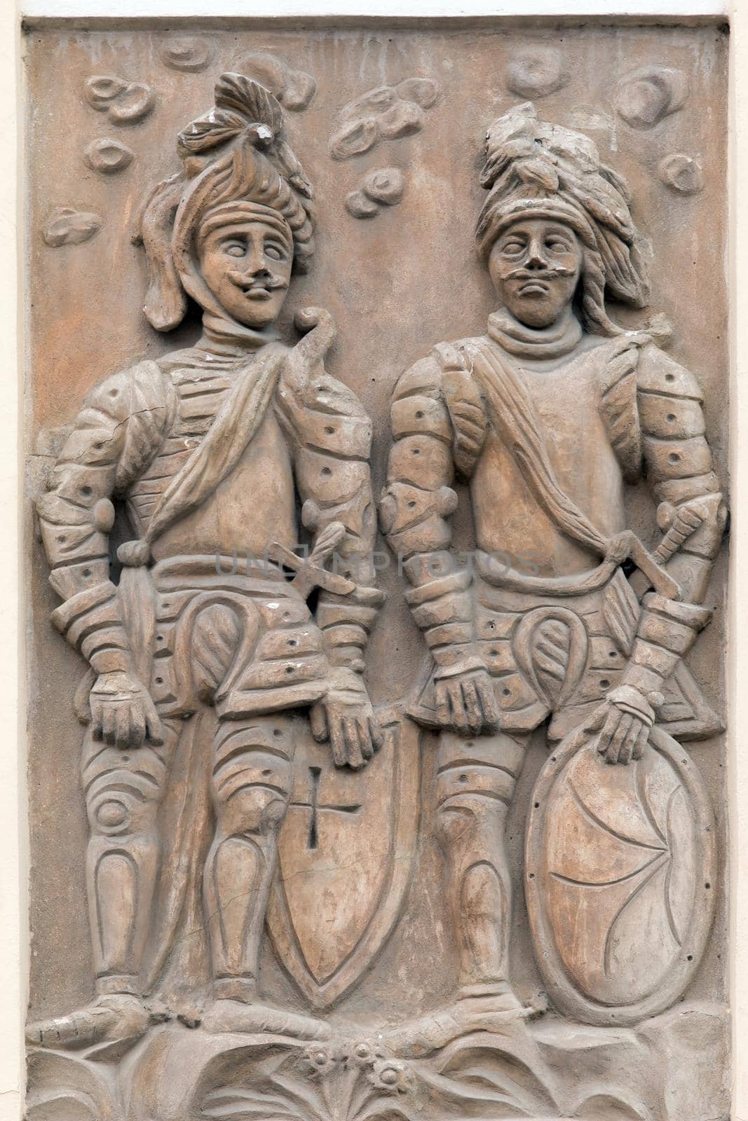 Relief of knights on the wall of a house in Kutna Hora - house sign, Kutna Hora, Czech Republic