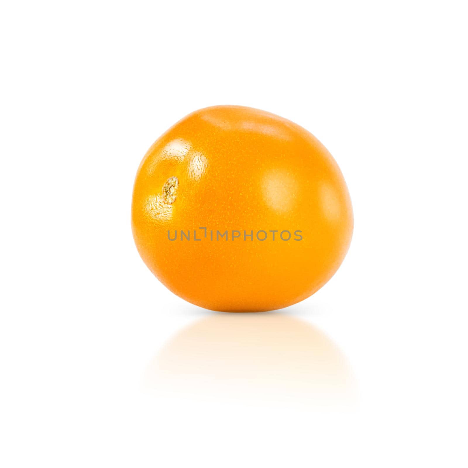 Yellow tomato isolated on a white background with shadow and reflection.