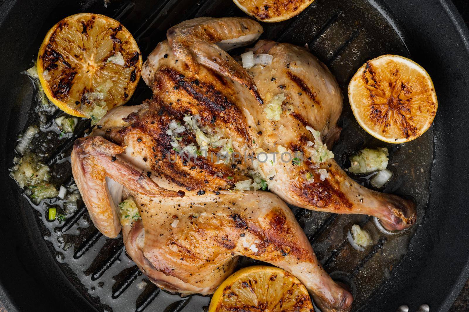 Baked whole chicken meat, on old rustic background, top view
