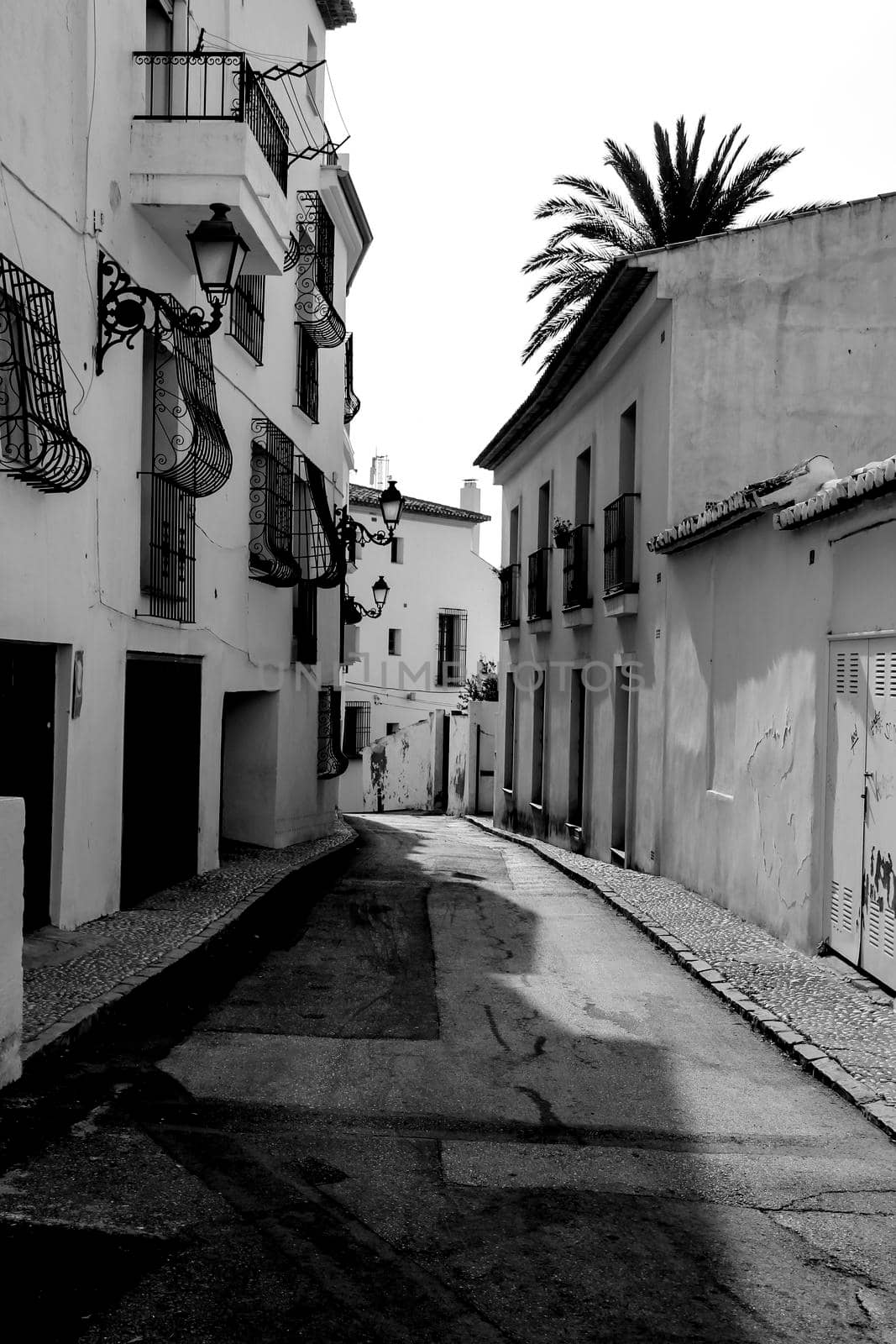 Narrow streets and beautiful whitewashed facades in Altea village, Alicante, Spain
