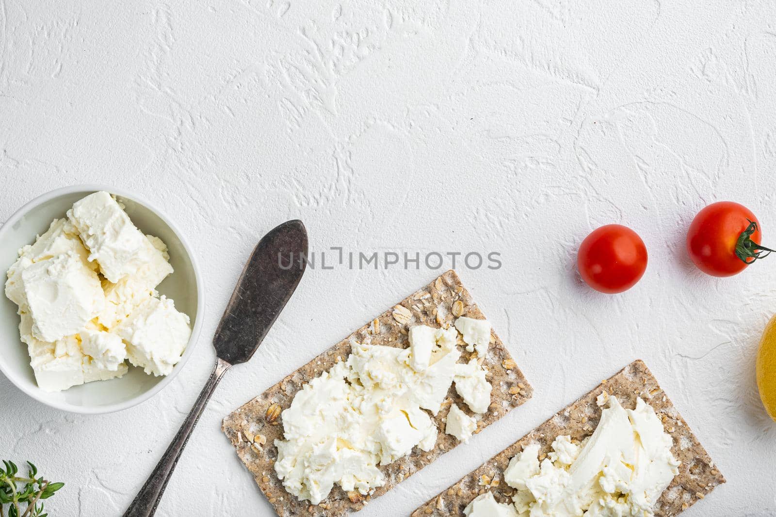 Crisp bread sandwich set, on white stone table background, top view flat lay, with copy space for text