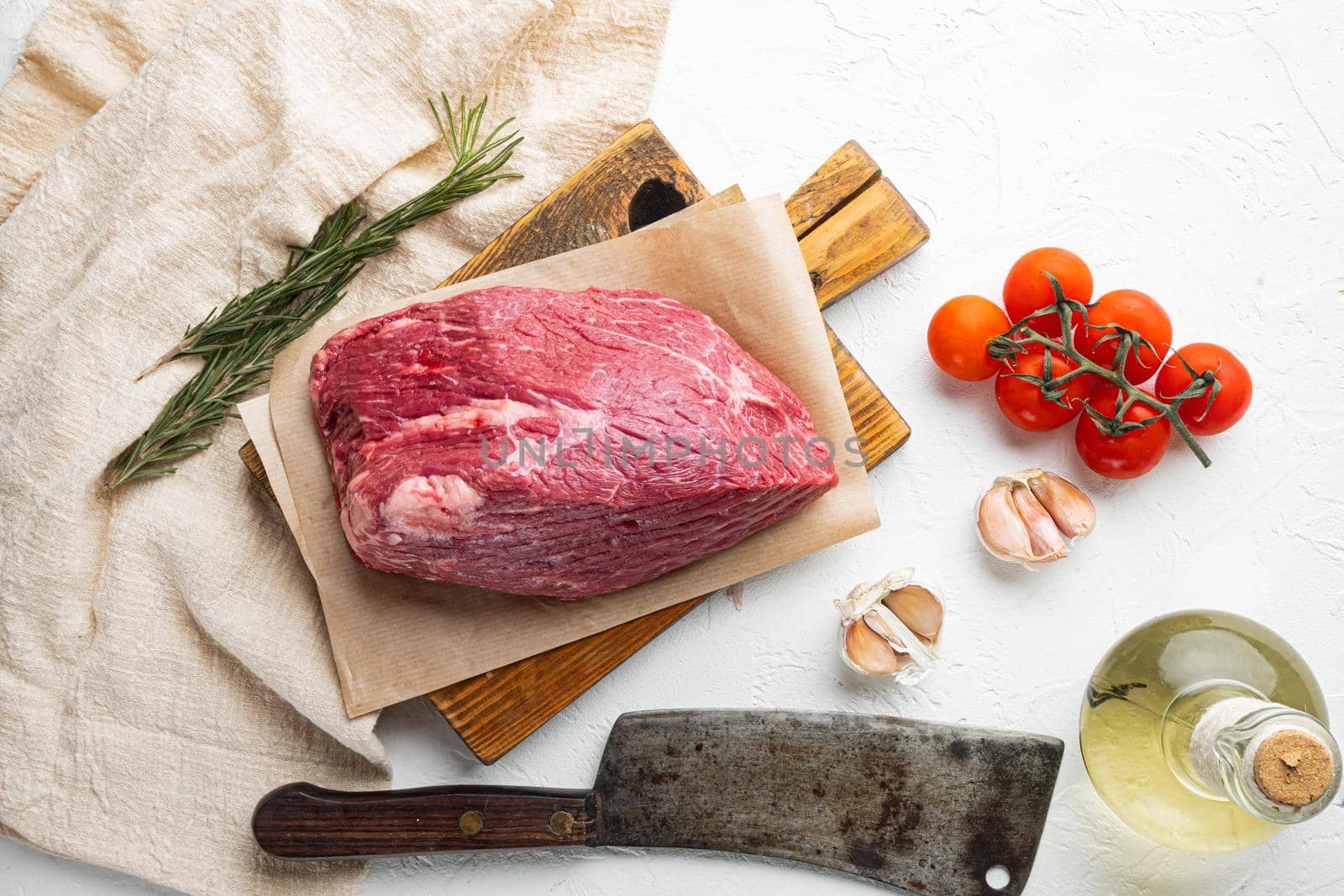 Beef meat cut raw set, on wooden cutting board with old butcher cleaver knife, on white background
