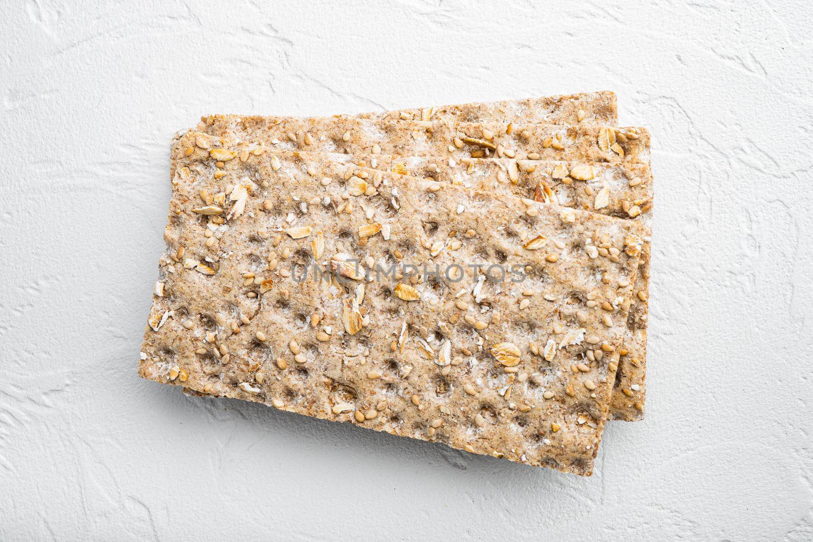Crunchy crispbread Healthy snack set, on white stone table background, top view flat lay