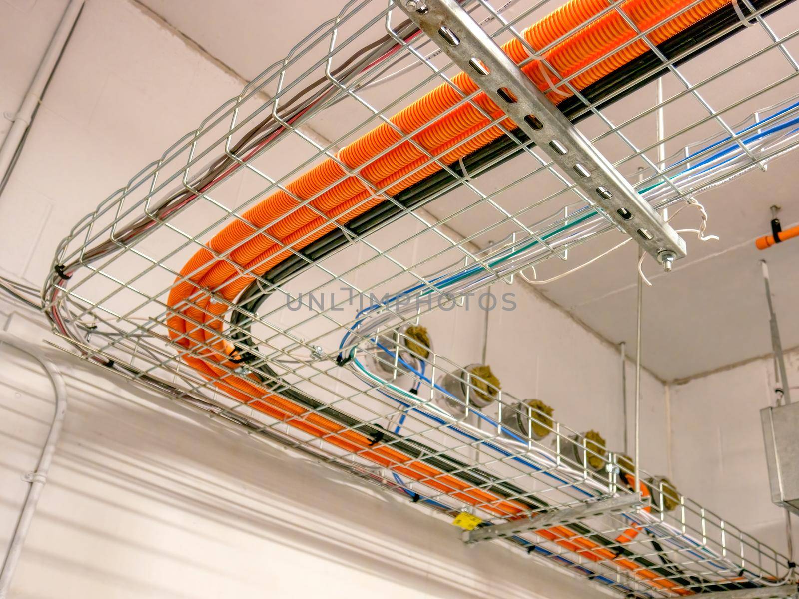 Corner cable route installed on metal wired tray.