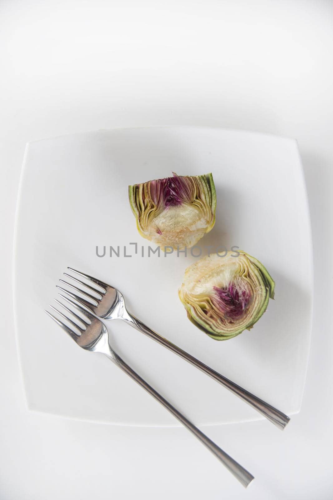 Fresh artichoke dish by fotografiche.eu