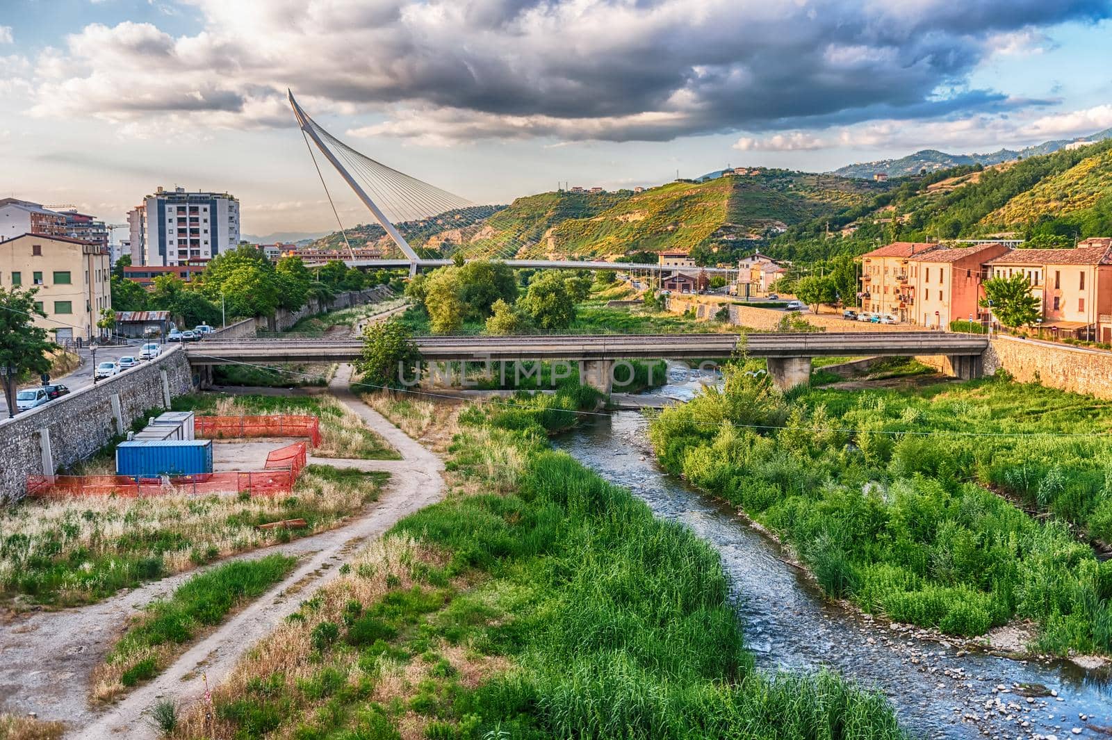 Scenic view over the Crathis river and Calatrava's Bridge in the Old Town of Cosenza, Italy