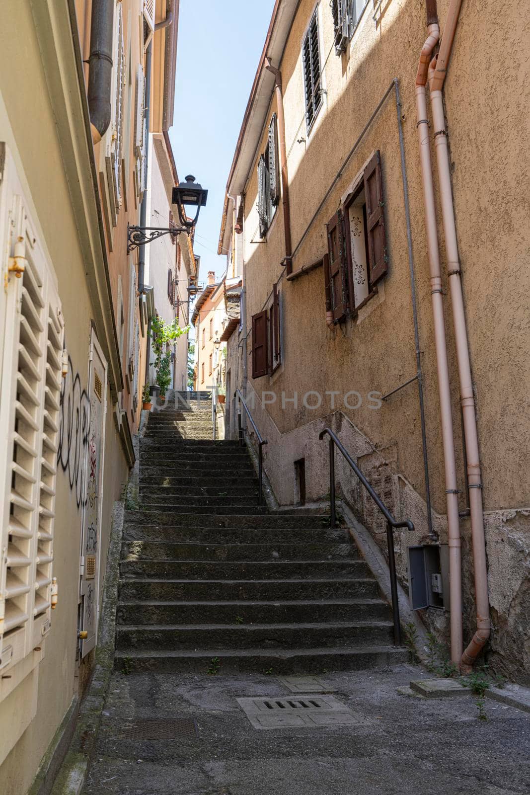 Muggia, Italy. June 13, 2021.  a narrow staircase between the streets of the historic center of the town