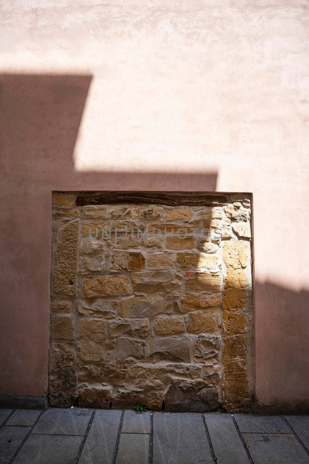 Muggia, Italy. June 13, 2021. the walled entrance door of a house in the town center