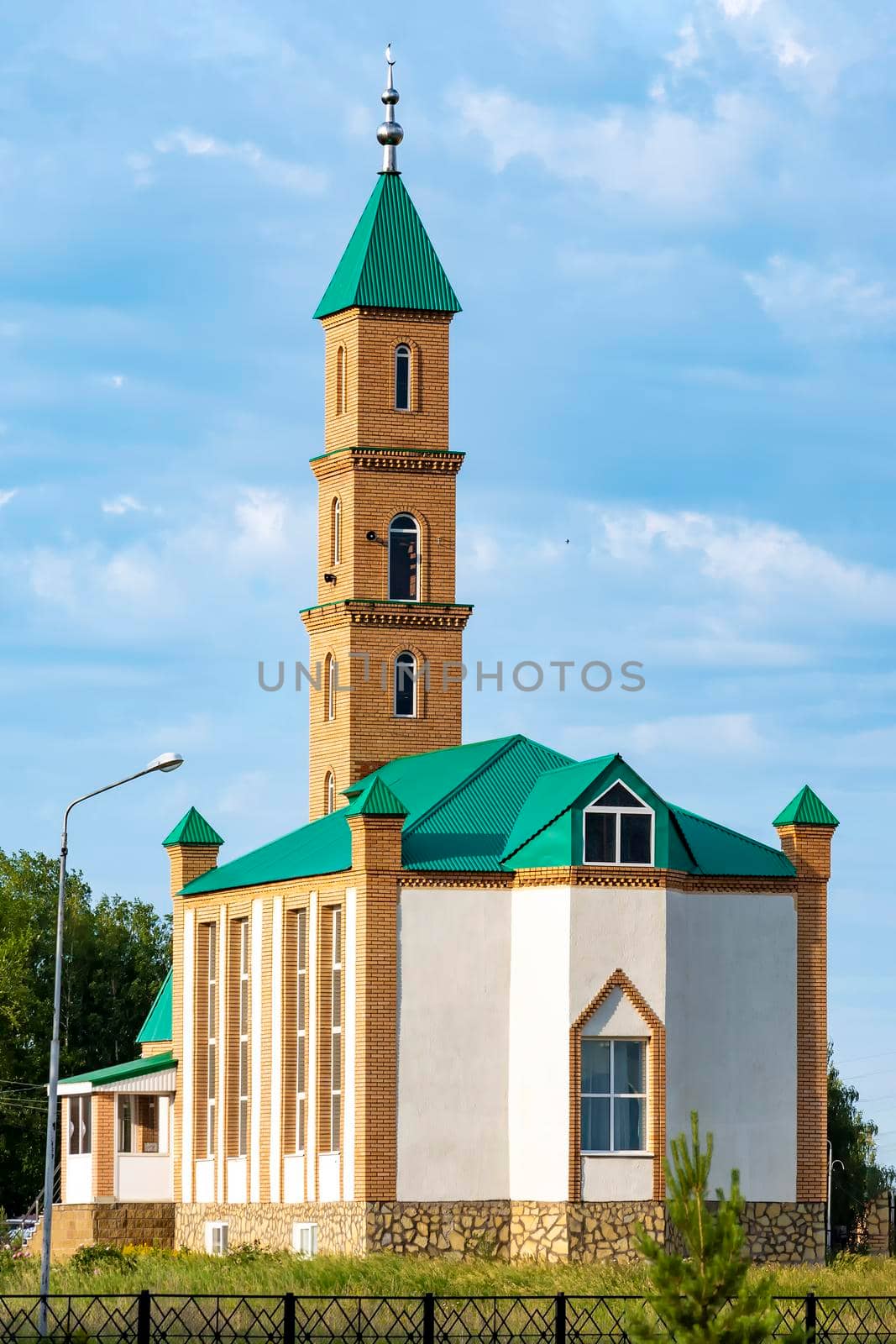 Mosque against a beautiful sky. Outdoors, day light front view. by Essffes
