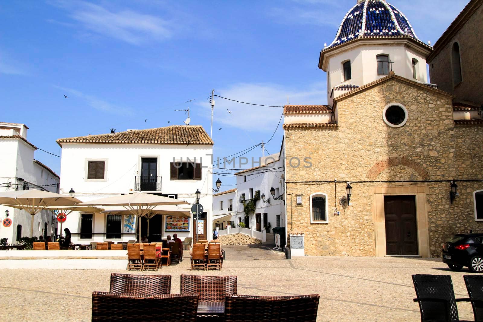 Altea, Alicante, Spain- June 12, 2021:The Virgin of the Consol church in Altea square in the morning in summer
