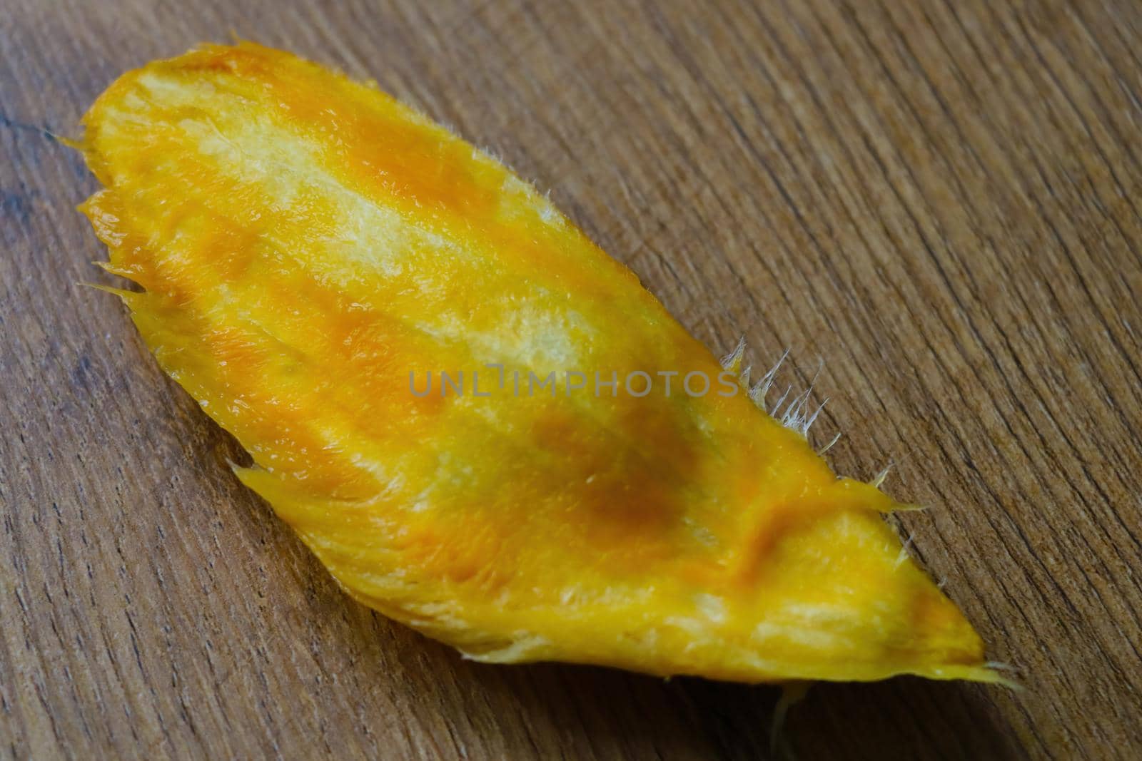 A long bone from a mango lies on the table