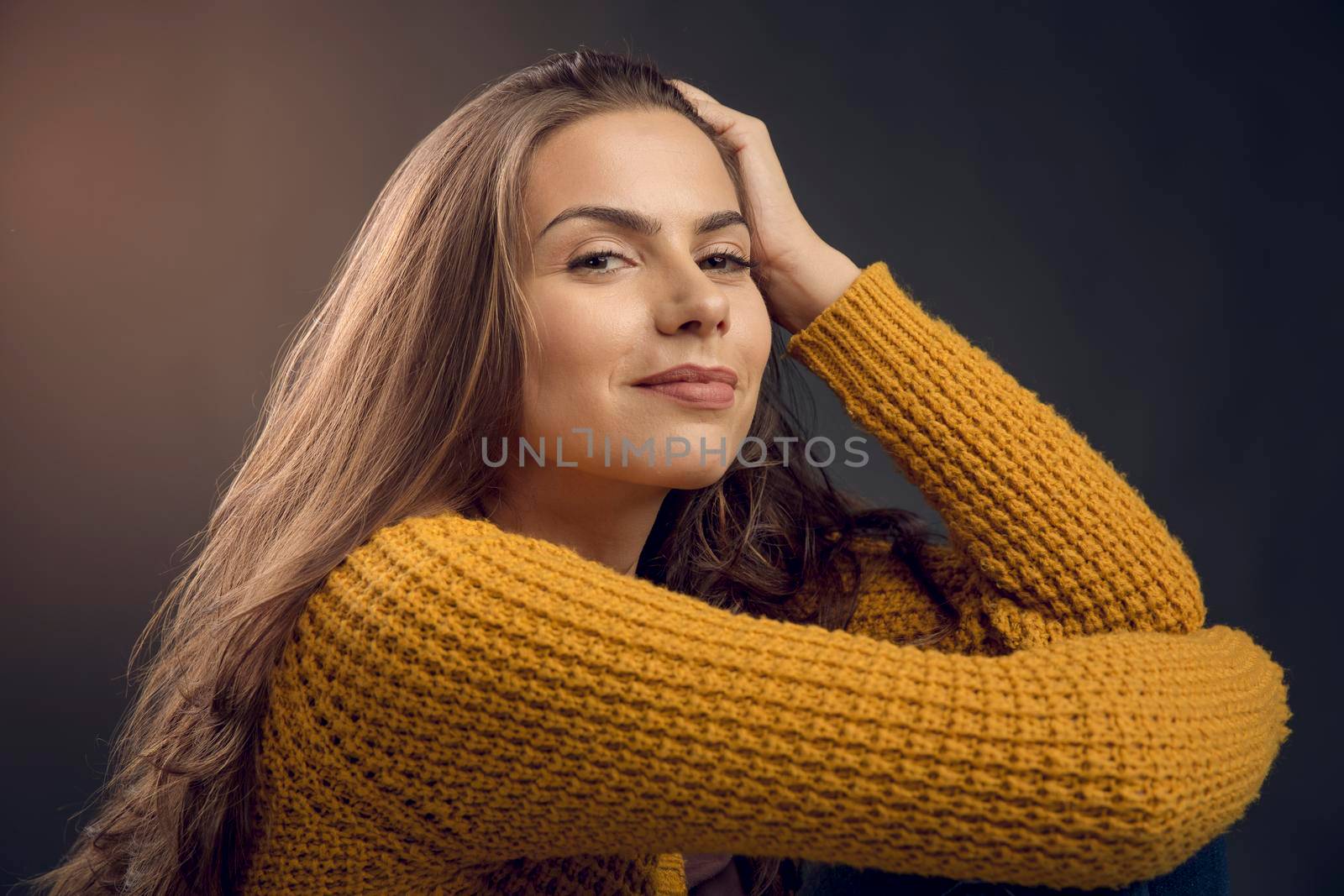 Shot of a beautiful young woman smiling to the camera and smiling