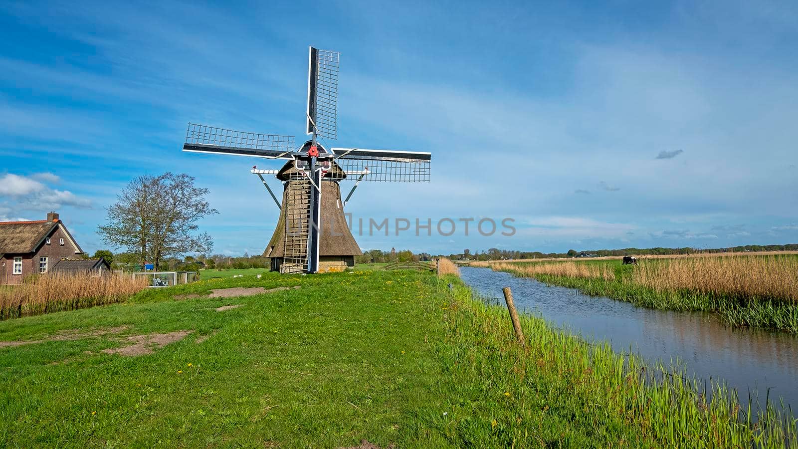 Oudkerker windmill in the countryside from the Netherlands