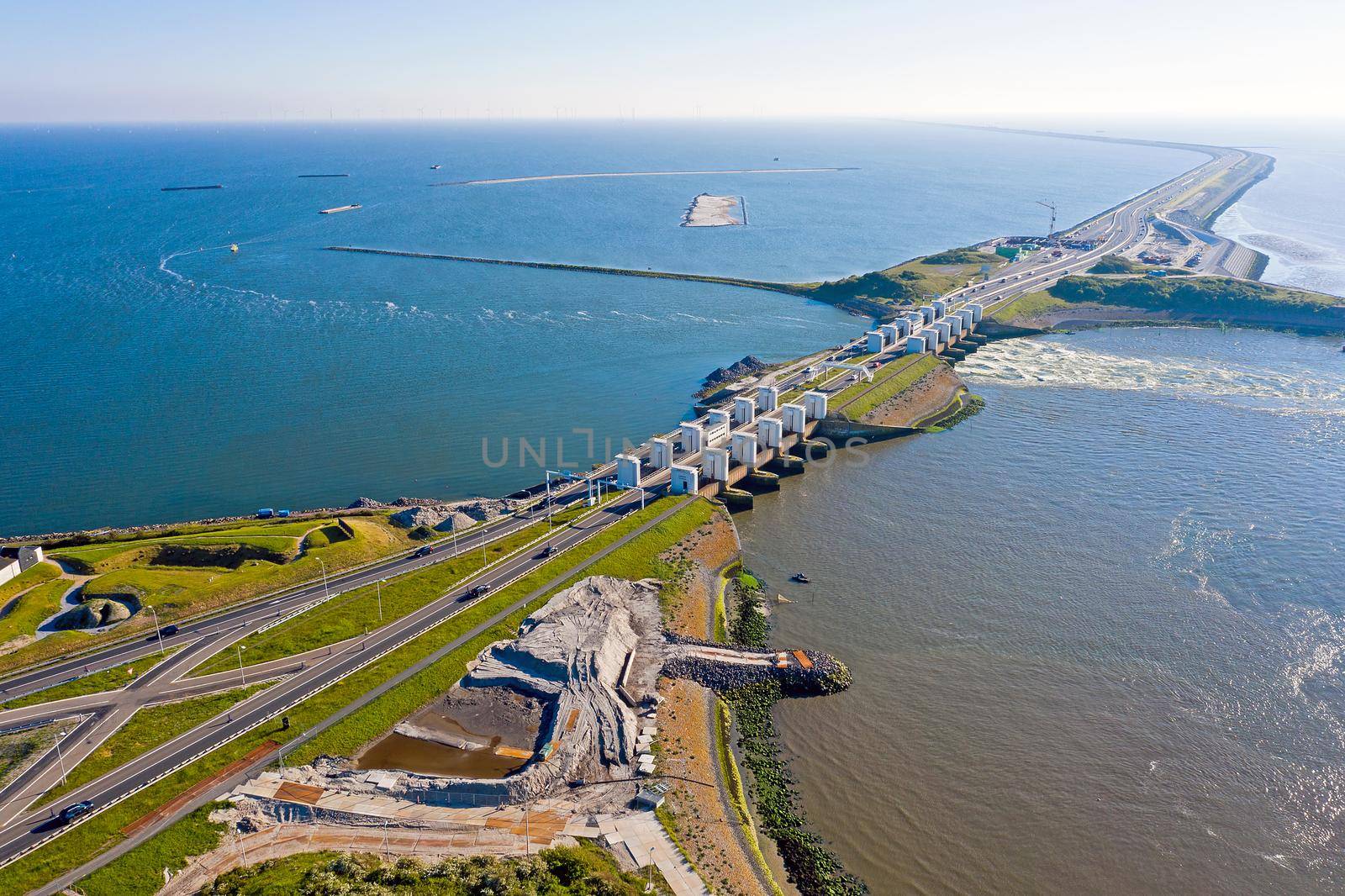 Aerial from sluices at Kronwerderzand at the Afsluitdijk in the Netherland by devy