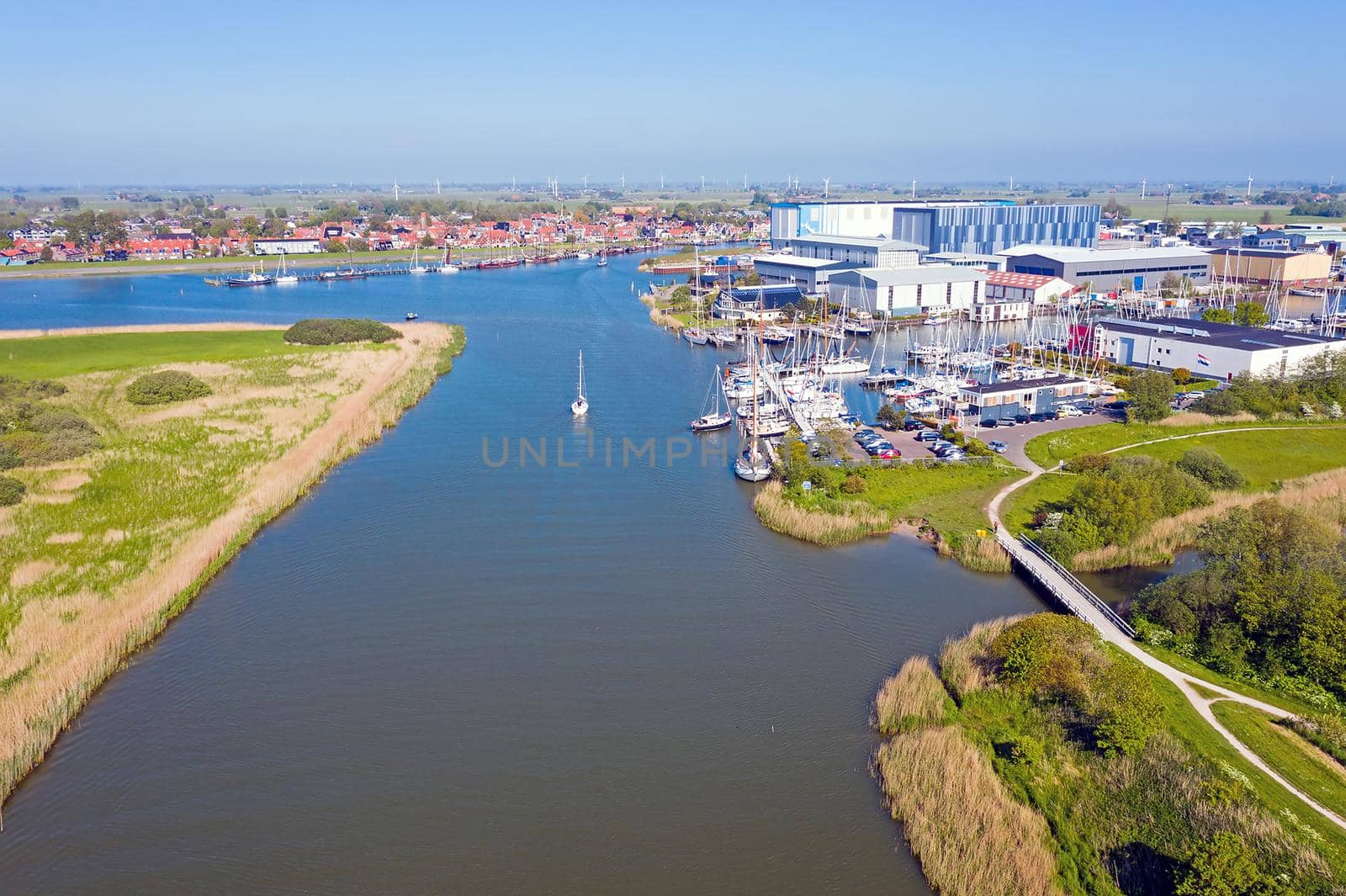 Aerial from the little village and harbor from Workum in Friesland in the Netherlands by devy