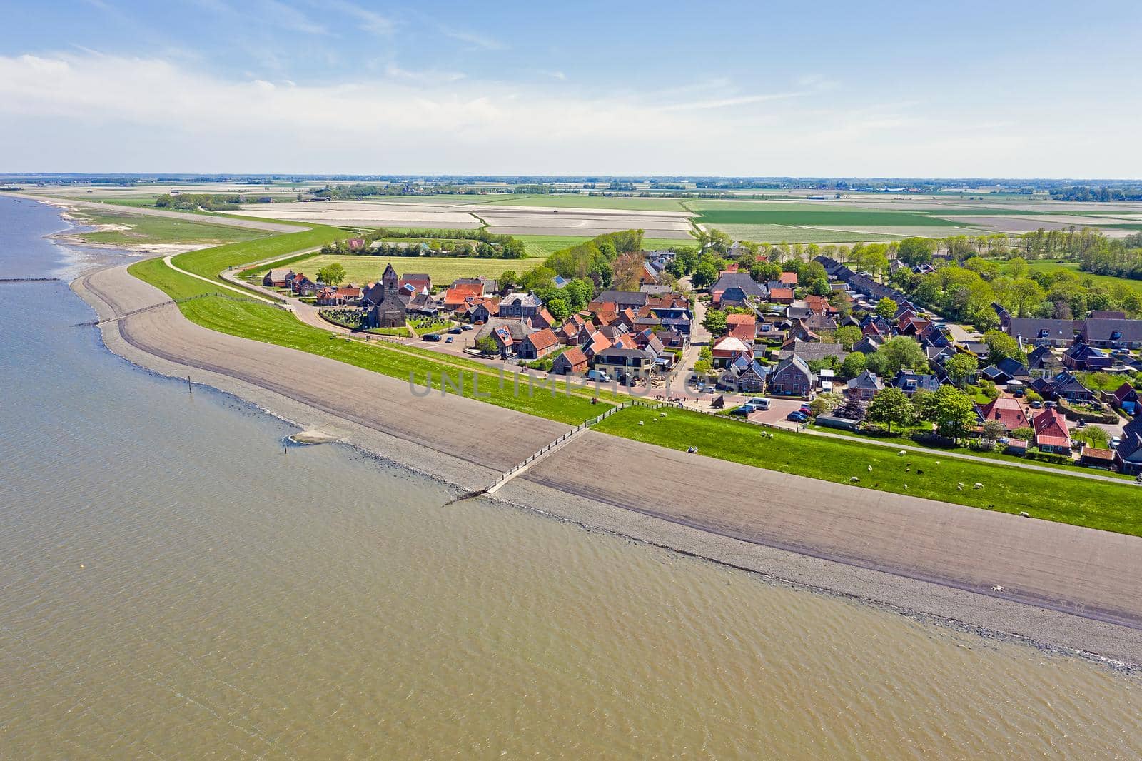 Aerial from the little village Wierum at the Wadden Sea in Friesland the Netherlands by devy