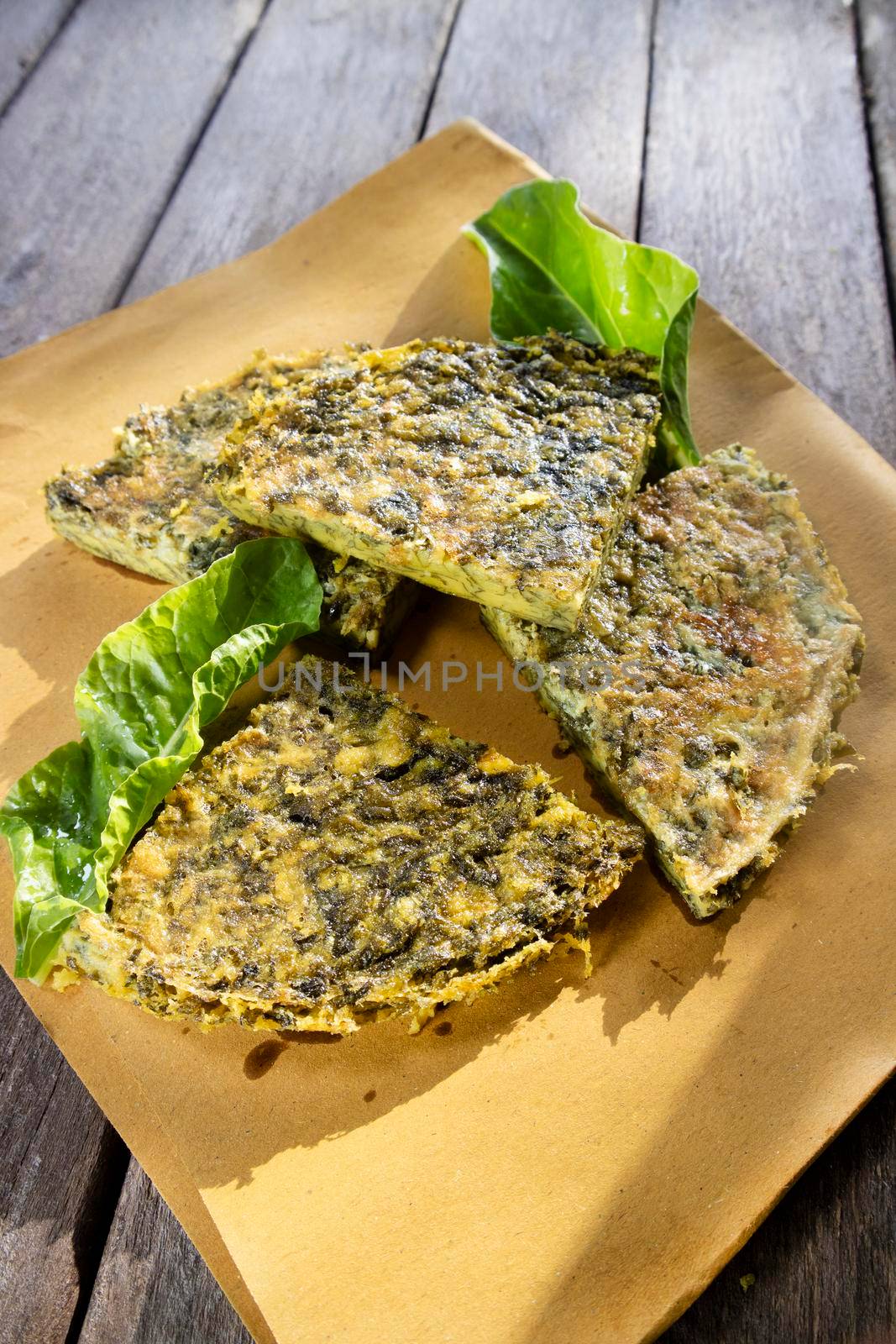 Vegan omelette cooking made with natural ingredients such as chickpea flour and chard 