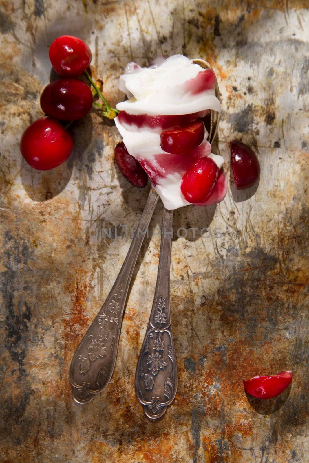 Artisan ice cream made with cream and cherries