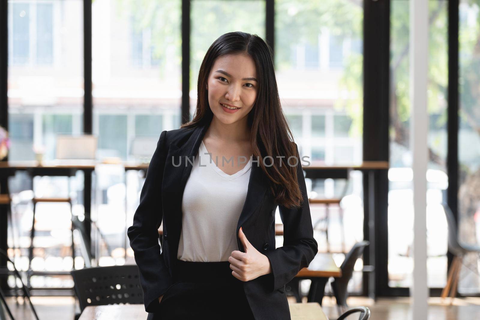 A successful organization as a manager is represented by a happy entrepreneur or businesswoman. by itchaznong