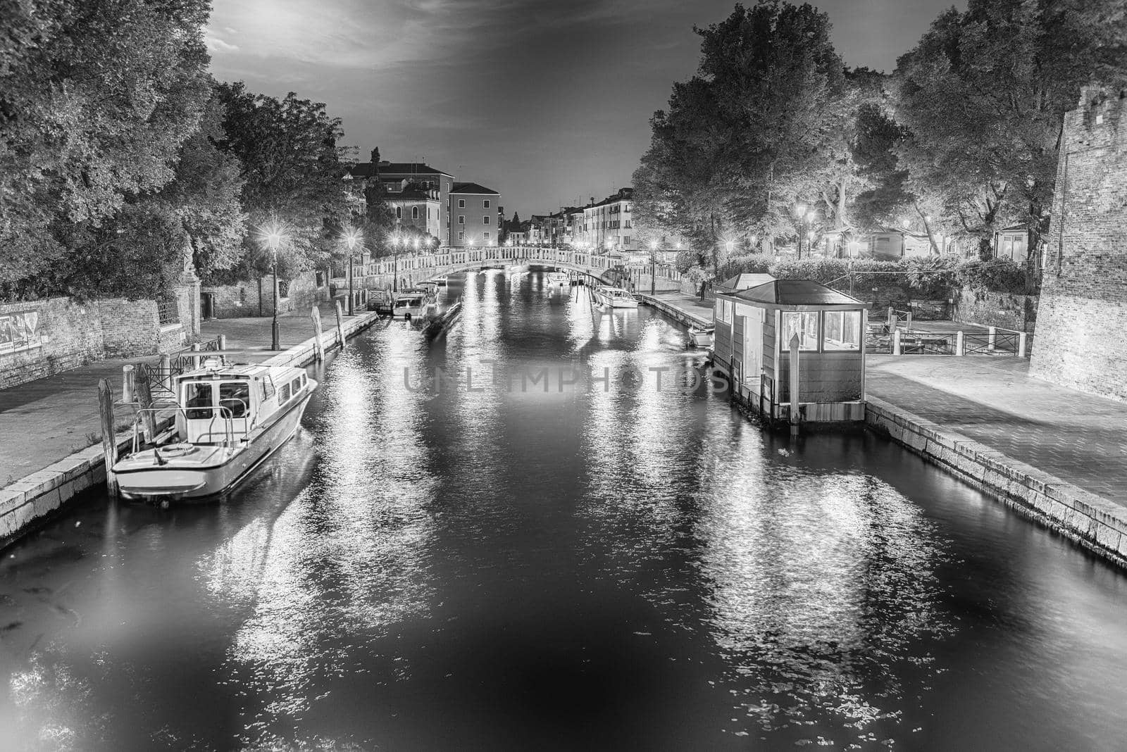 View over the picturesque canal Rio Novo at night, in Santa Croce district of Venice, Italy