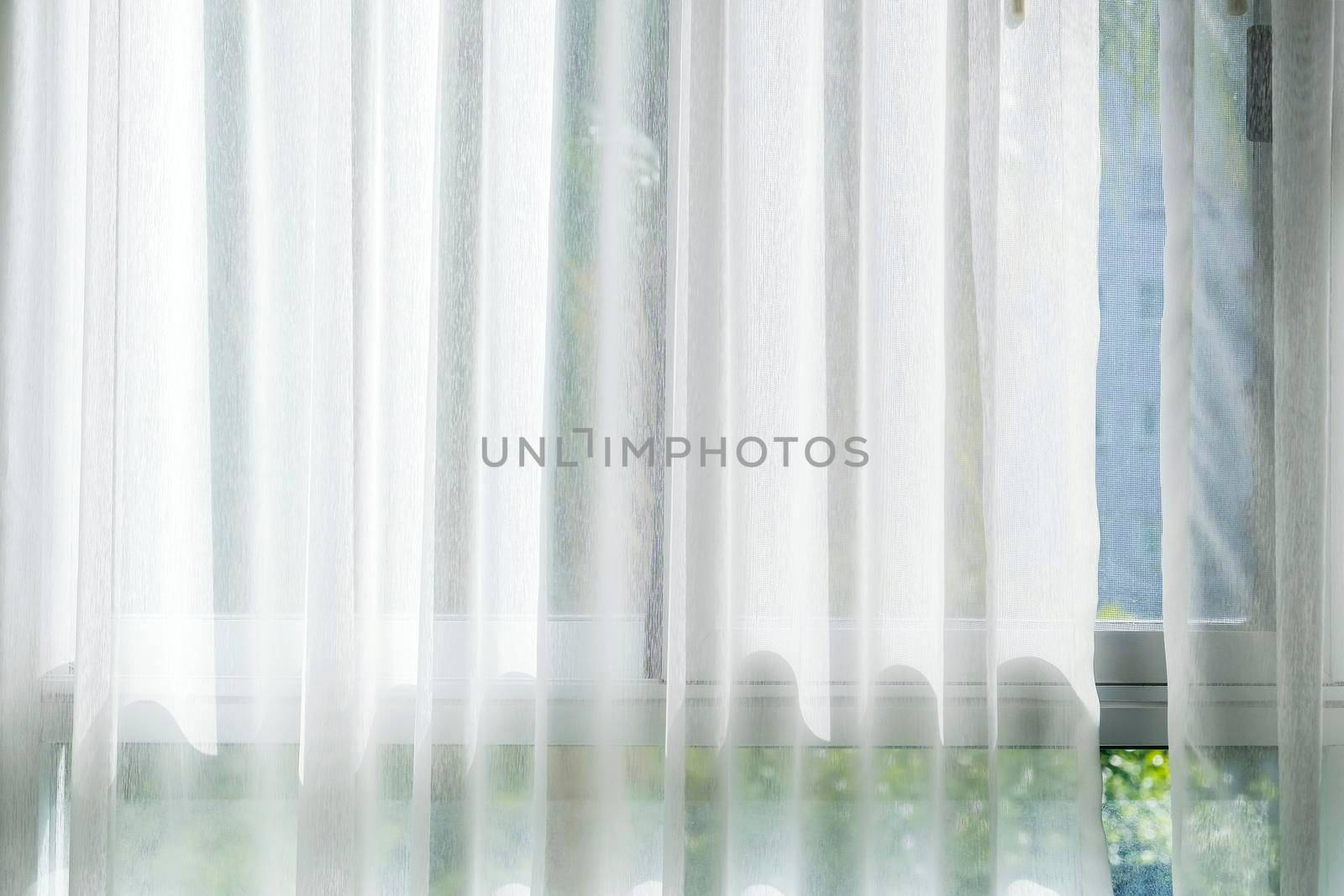 White curtain at the window with sunlight by Myimagine