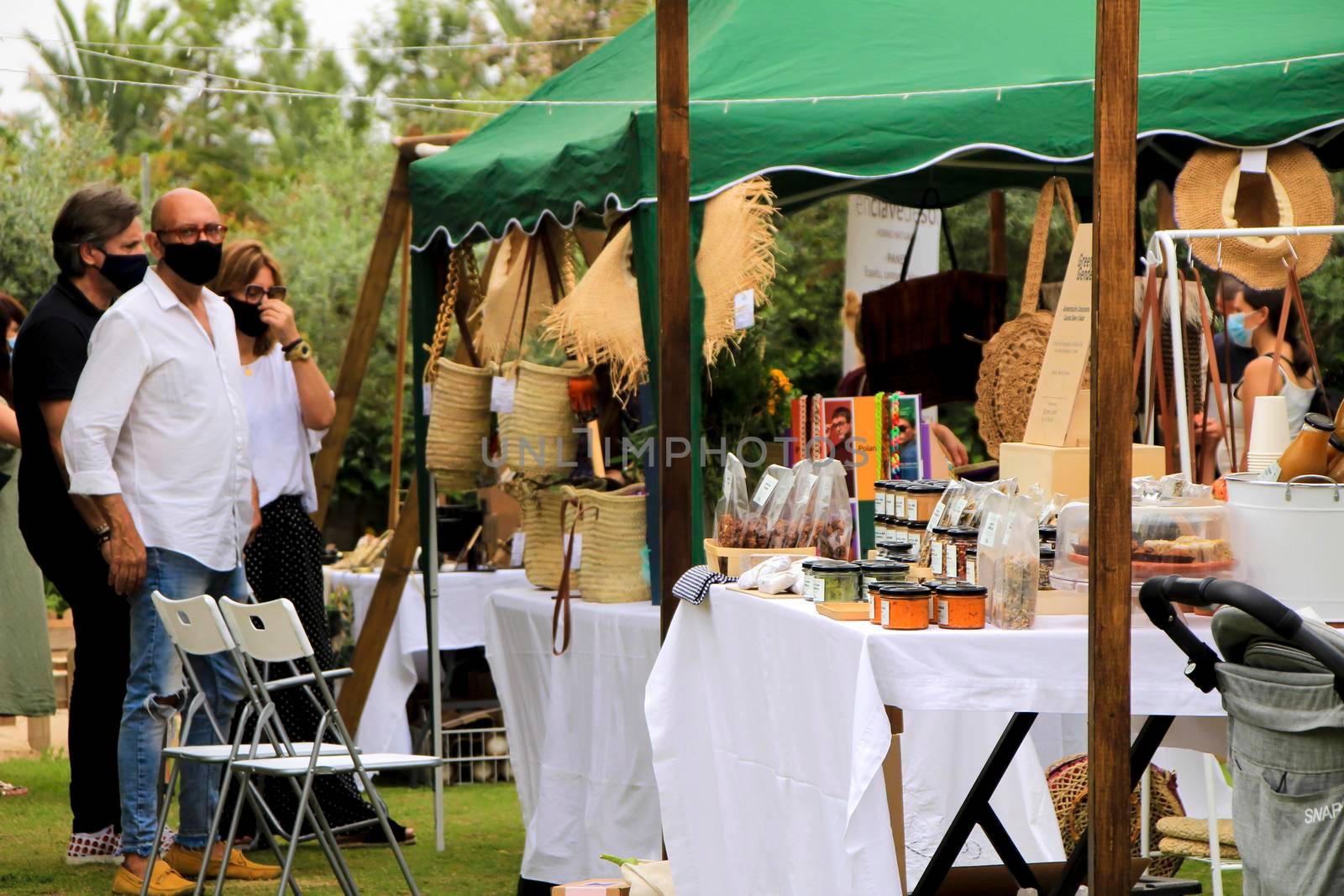 Elche, Alicante, Spain- June 20, 2021: Ecological, secondhand and sustainable market held in a rural setting in the countryside of Elche