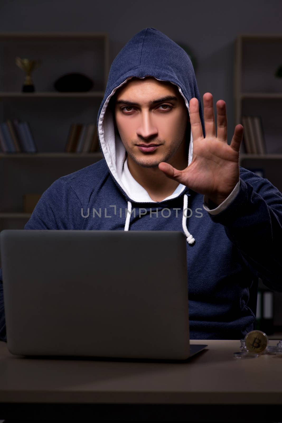Hacker hacking the data late at night