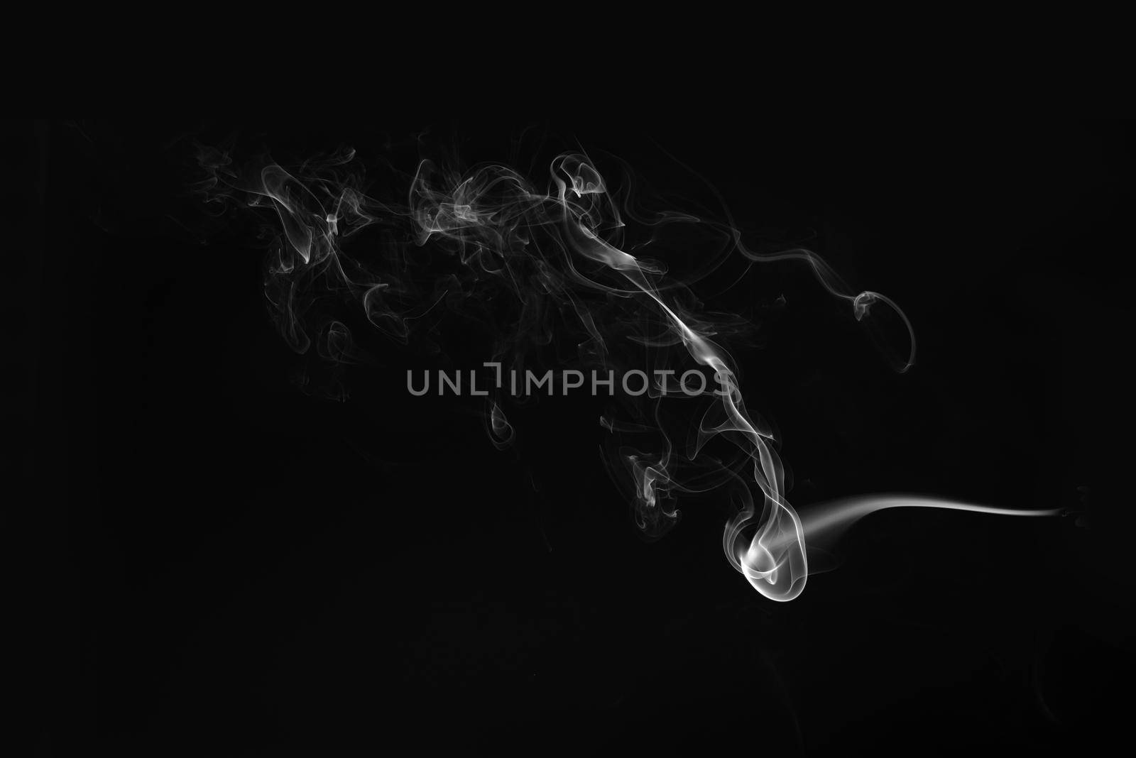 Smoke on a black background. by thanumporn