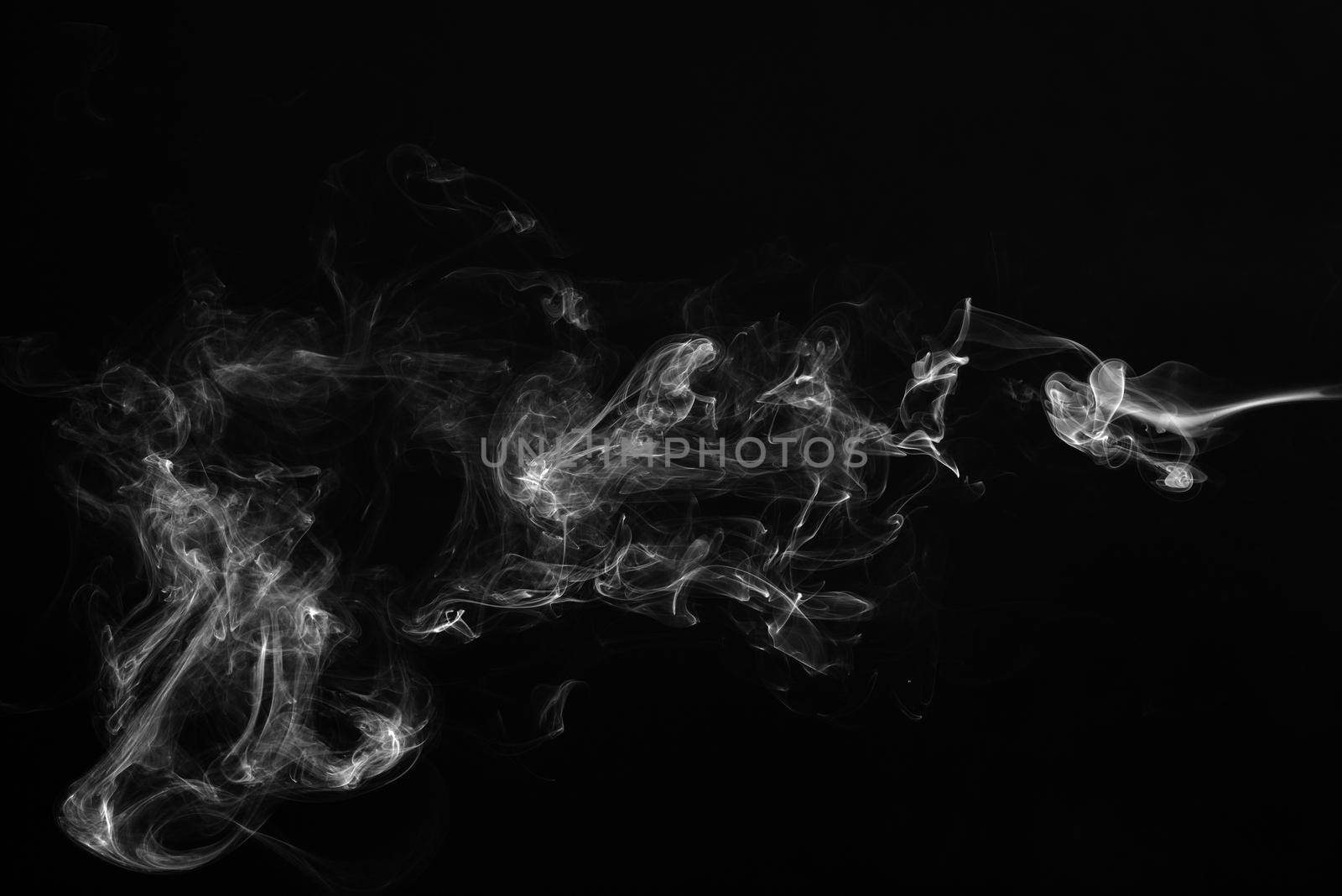 Smoke on a black background. by thanumporn