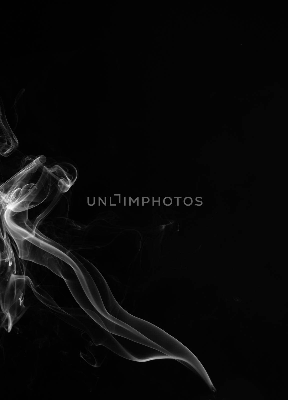 Smoke on a black background. by thanumporn