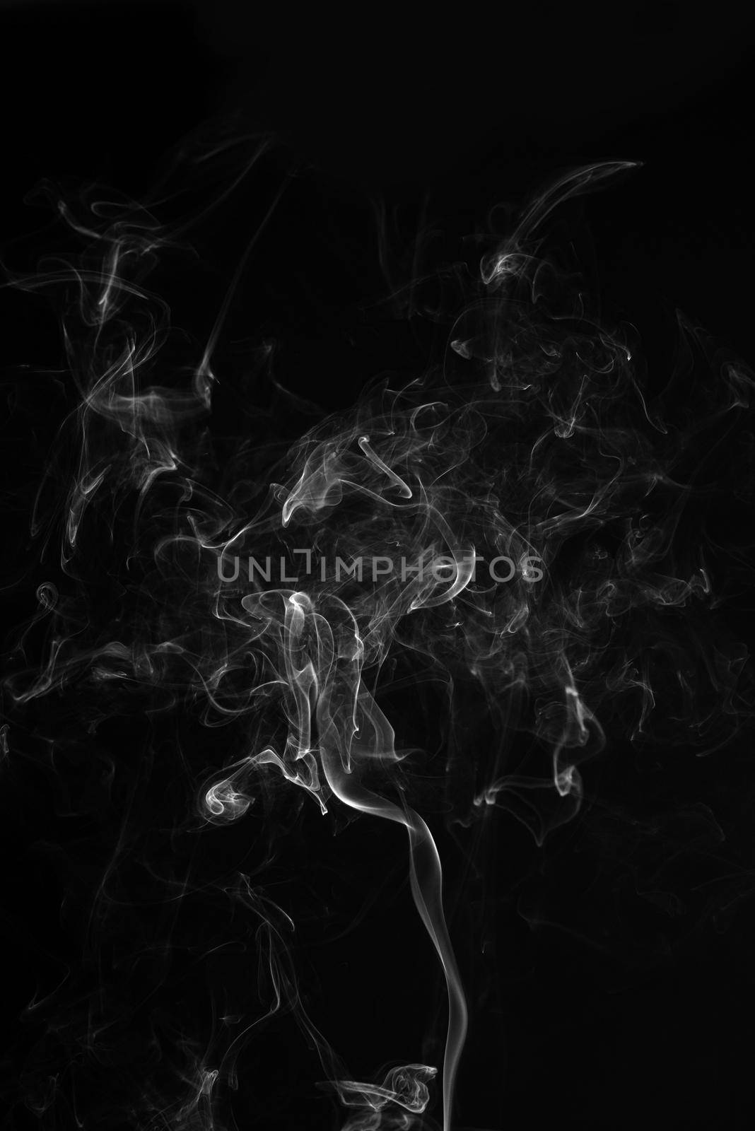 Smoke on a black background. by thanumporn