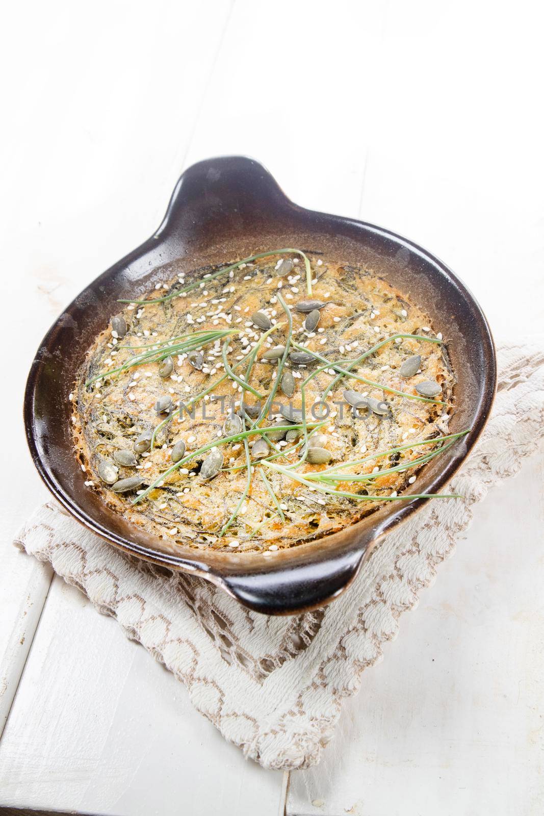 Vegan omelette cuisine made with natural ingredients such as chickpea flour and agretti 