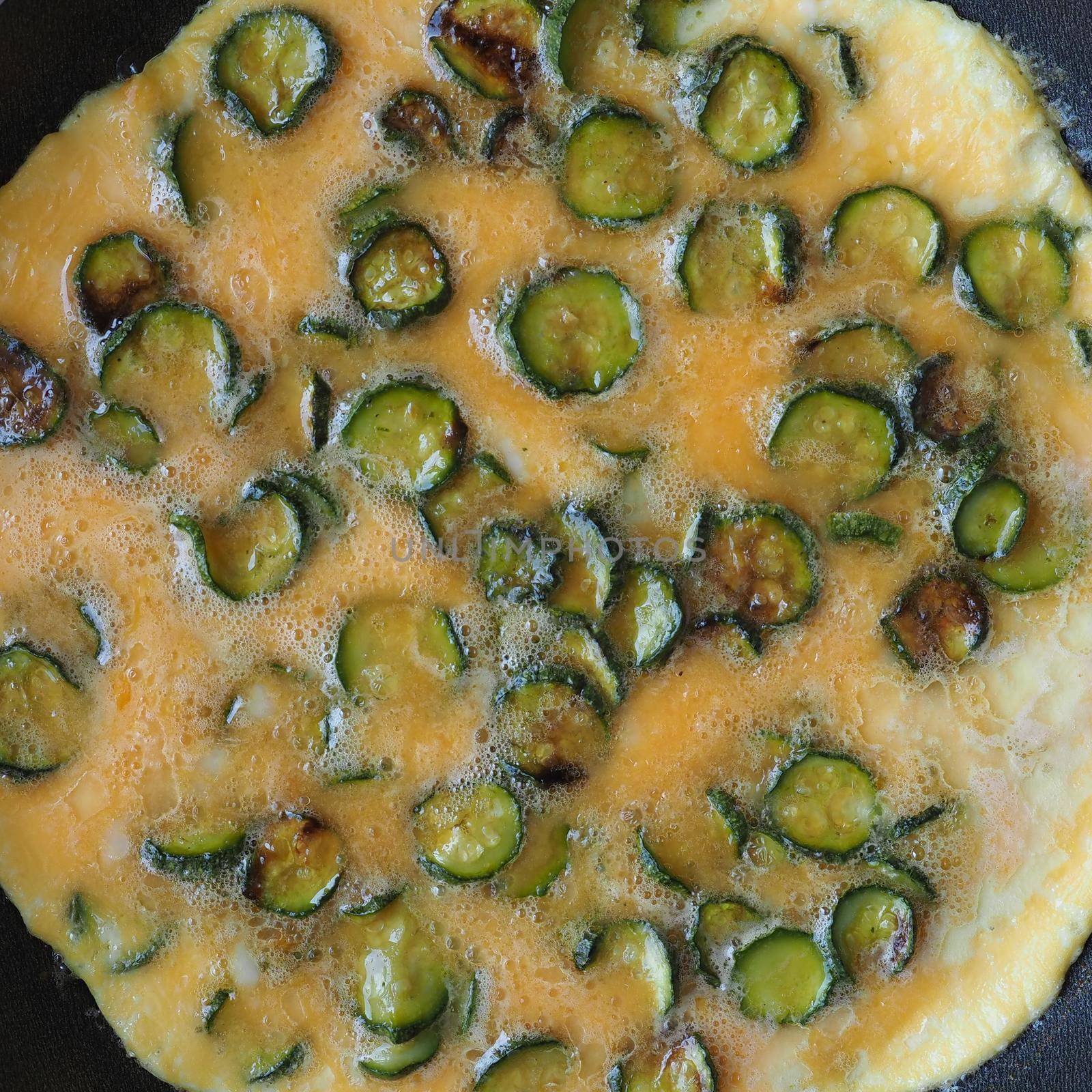 omelet made with eggs and zucchini vegetables