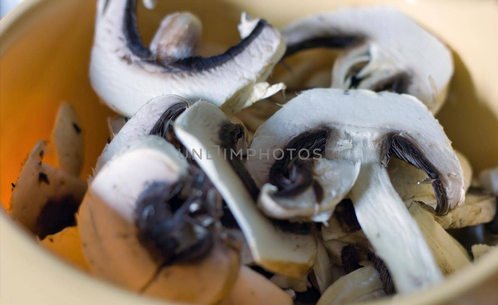 Fresh cut mushrooms in a package macro by arpanbhatia