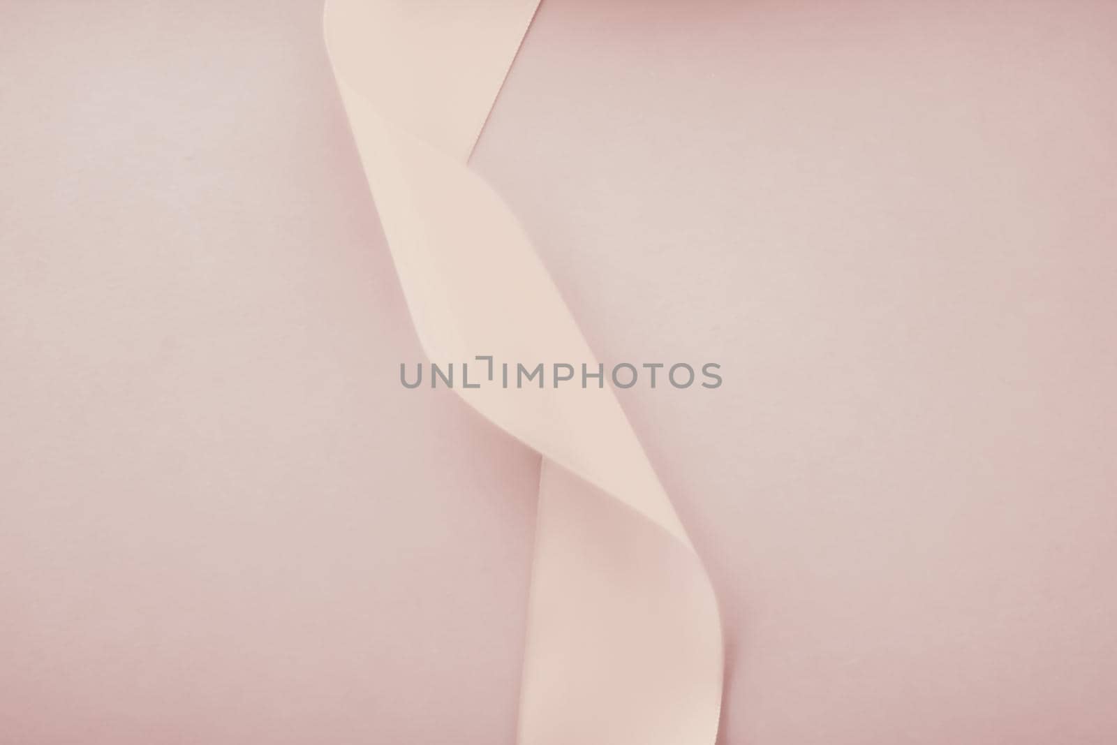 Branding, holidays and luxe brands concept - Abstract curly silk ribbon on pastel background, exclusive luxury brand design for holiday sale product promotion and glamour art invitation card backdrop