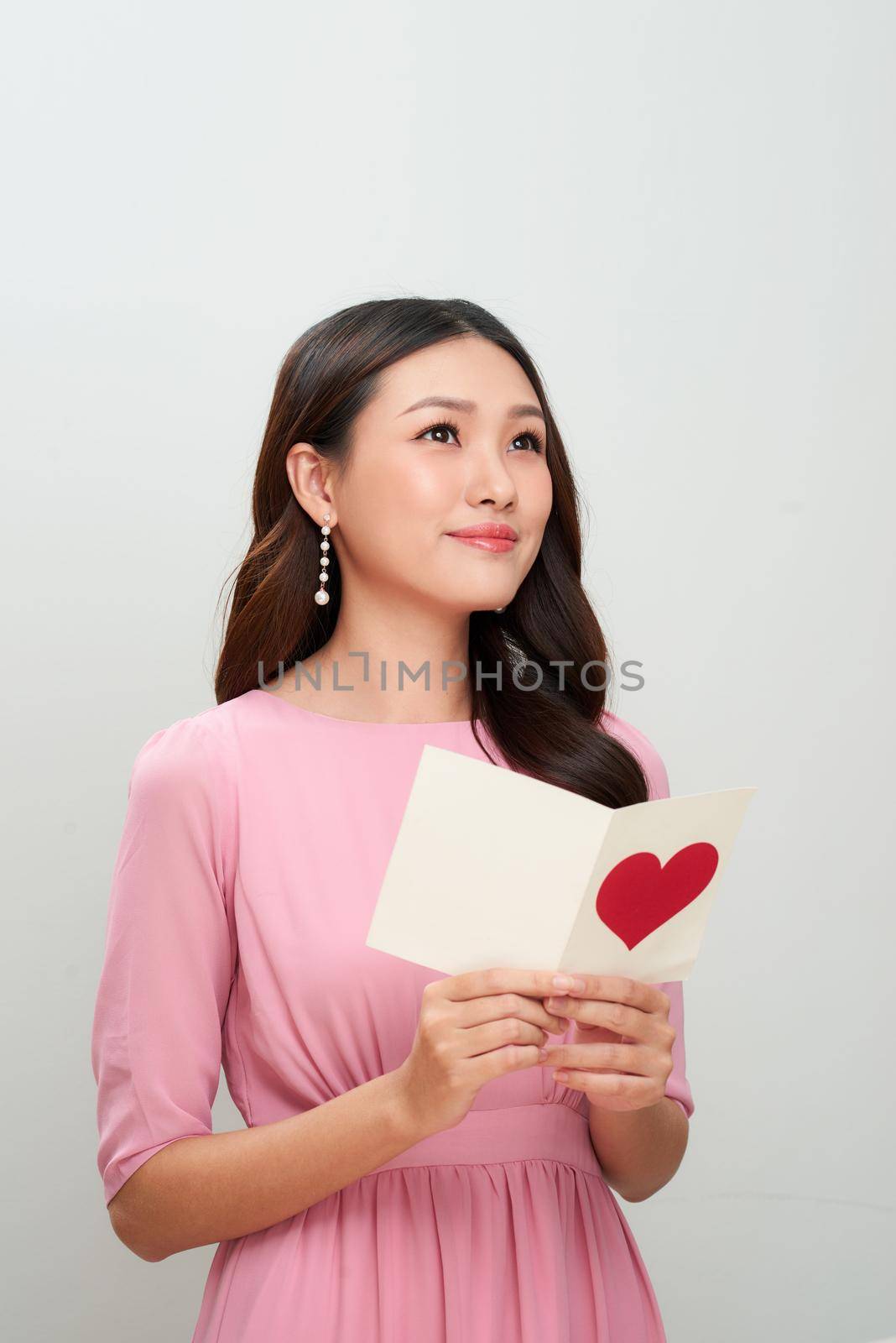 Beautiful asian girl with love letter. Happy woman day. by makidotvn