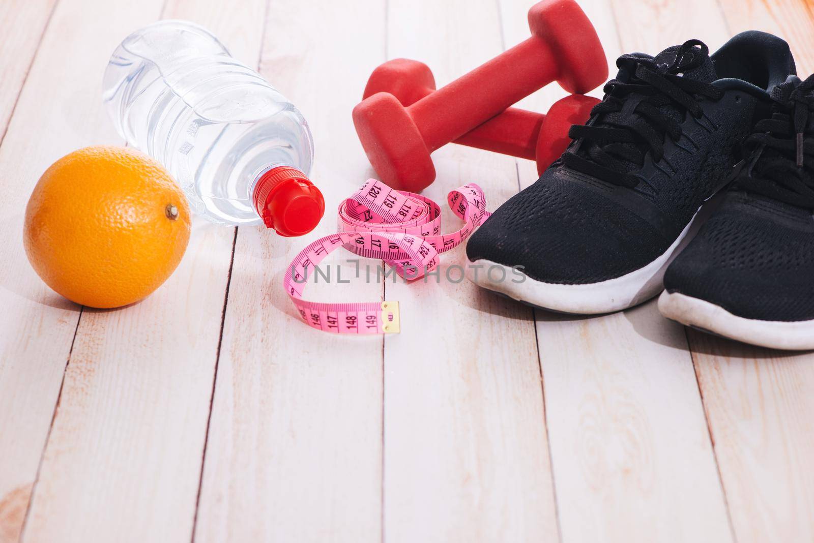 Overhead view of sport bra and sport equipments in pink color, healthy lifestyle concept with copy space by makidotvn