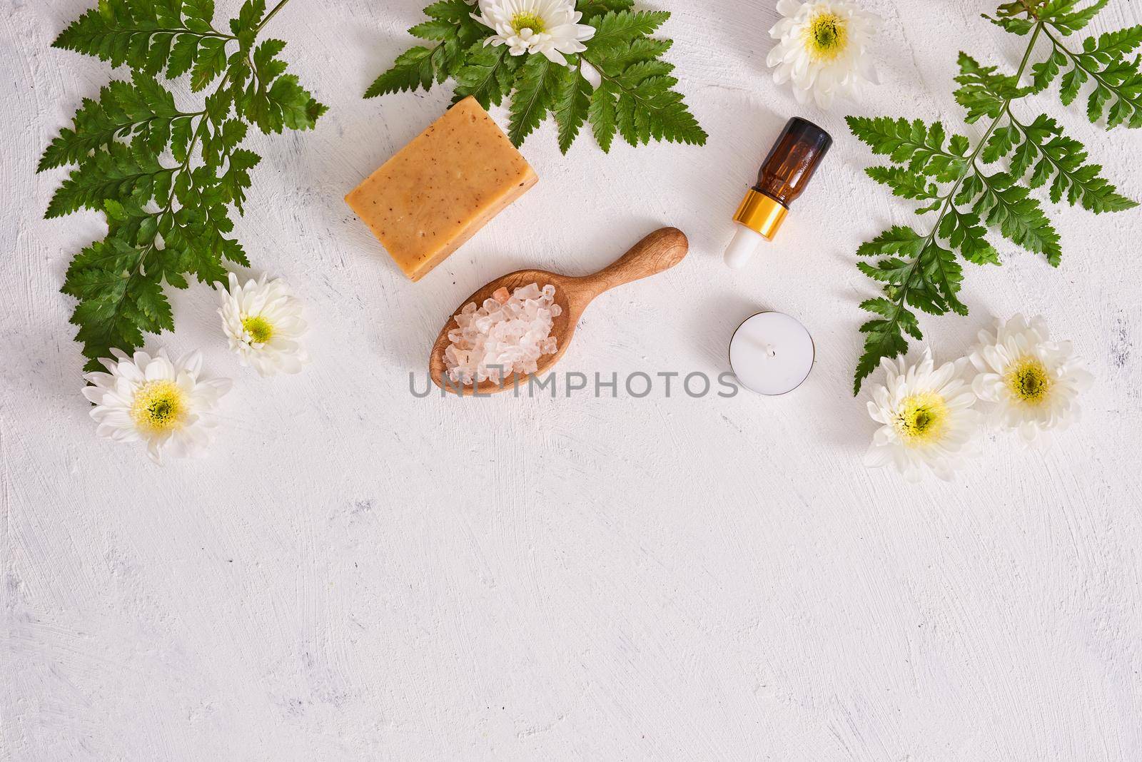 bathroom salt, soap and aroma oil for spa on white background top view mock-up by makidotvn