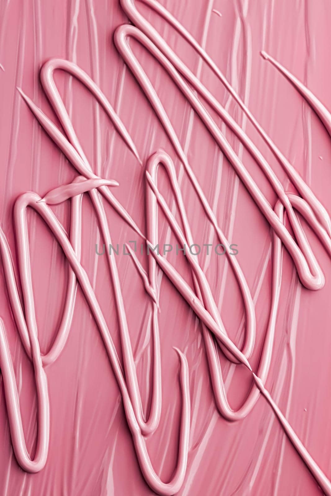 Pink lipstick or lip gloss texture as cosmetic background, makeup and beauty cosmetics product for luxury brand, holiday flatlay backdrop or abstract wall art and paint strokes.