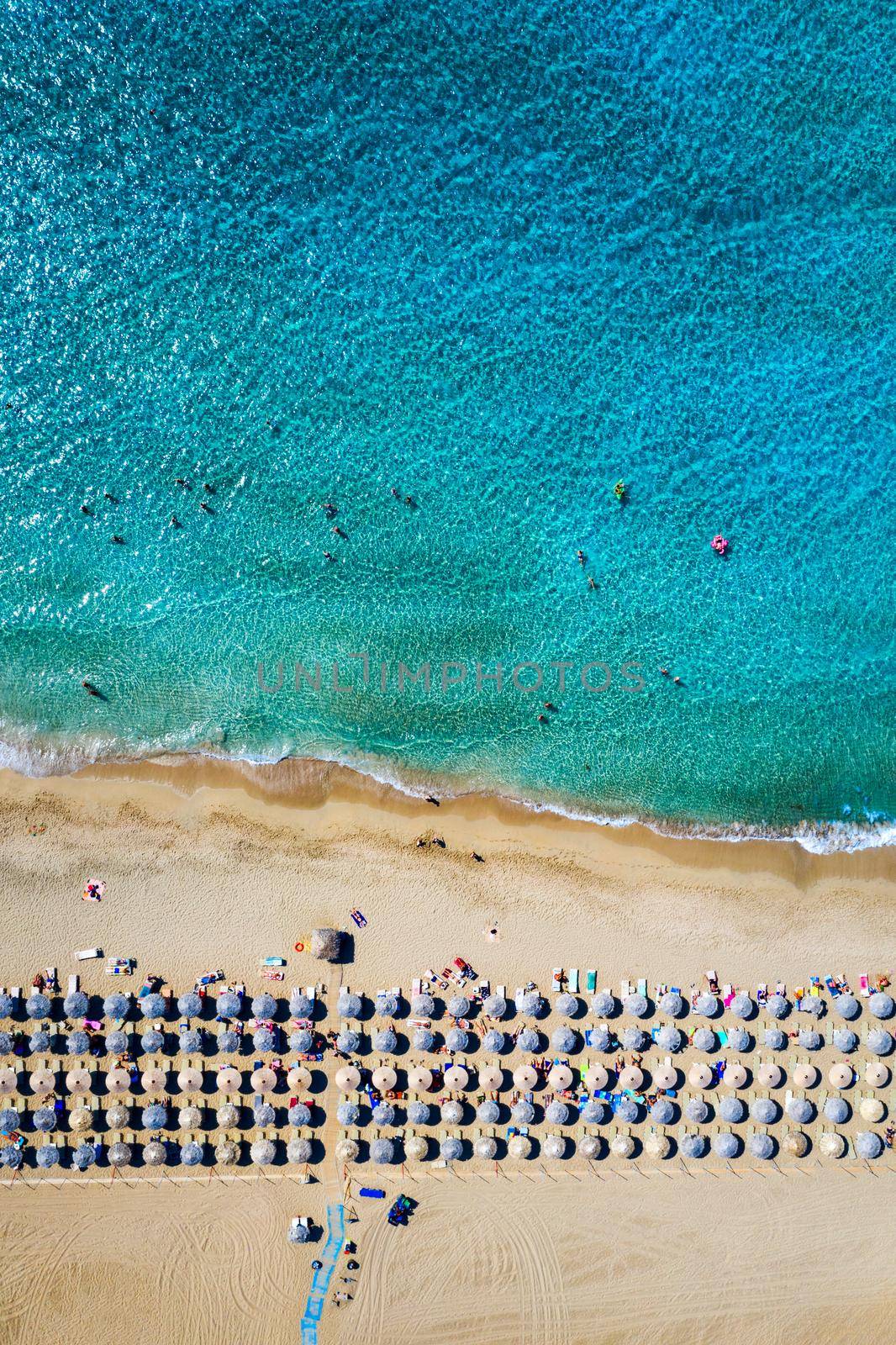 Aerial shot of beautiful turquoise beach Falasarna (Falassarna) in Crete, Greece. View of famous paradise sandy deep turquoise beach of Falasarna (Falassarna) in North West, Crete island, Greece.