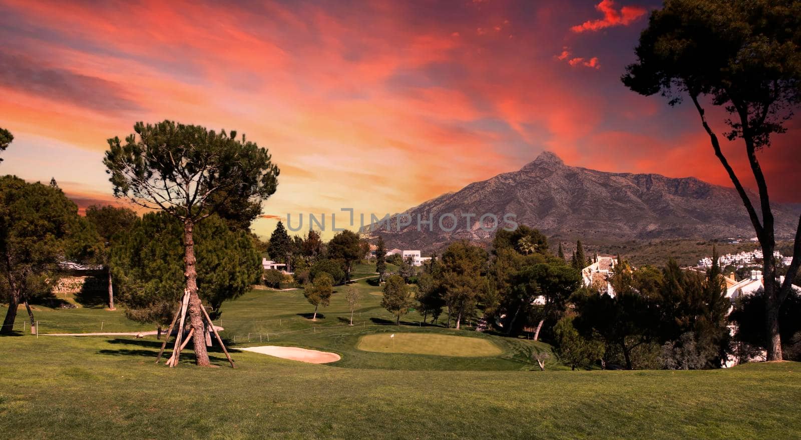 golf course and green  in Marbella, Spain, at sunset