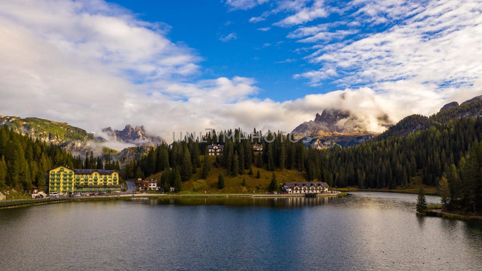 Tre Cime di Lavaredo peaks seen from Misurina lake in Dolomites, Italy in winter, Belluno-Trentino Alto Adige border. Misurina lake, Tre Cime di Lavaredo, Auronzo, Dolomiti, South Tyrol, Italy.