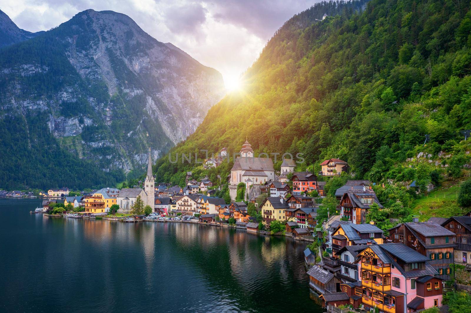 Aerial view of austrian mountain village Hallstatt and Hallstatter lake. Beautiful summer time. Salzkammergut, Austria. Hallstatt village over Hallstatter See, in Salzkammergut, Austria.